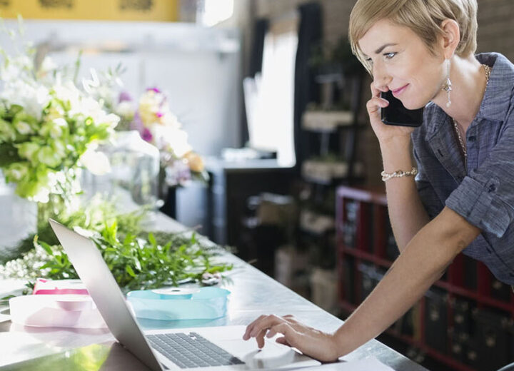 Woman Working In Floral Shop.