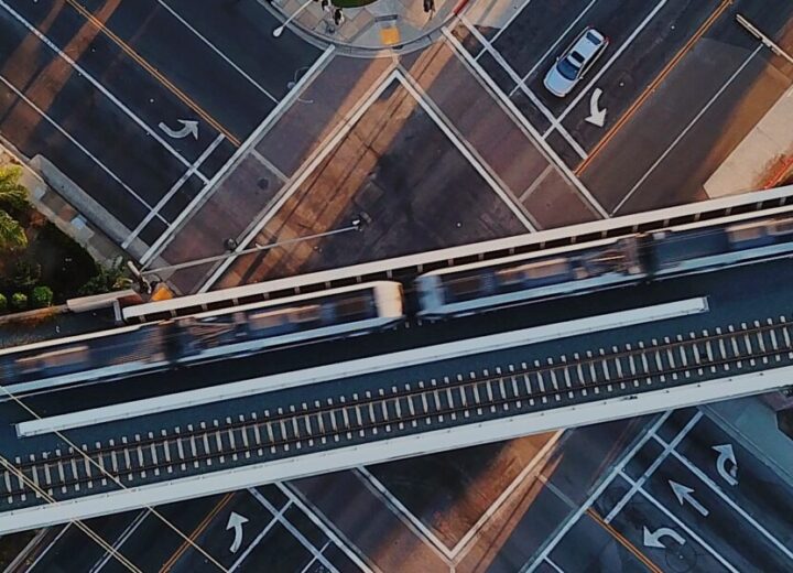 Train Crossing Intersection Above Streets