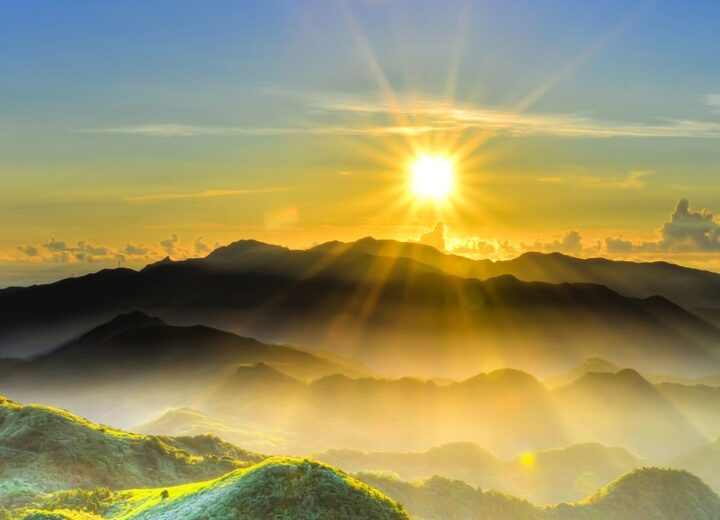 Sunrise Over Misty Mountain Landscape