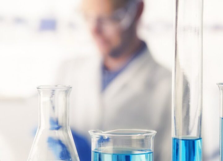 Laboratory Glassware With Blue Liquids.