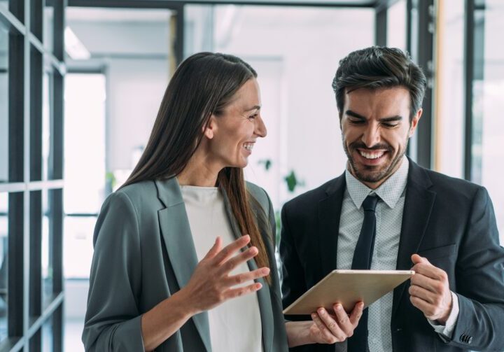Business Discussion In Modern Office Setting.