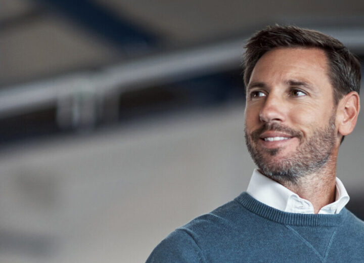 Man In Sweater, Indoor Setting.