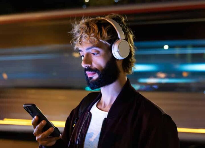 Person Listening To Music On Street.